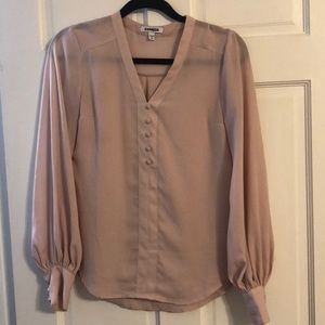 Light pink express blouse with flowy sleeve.